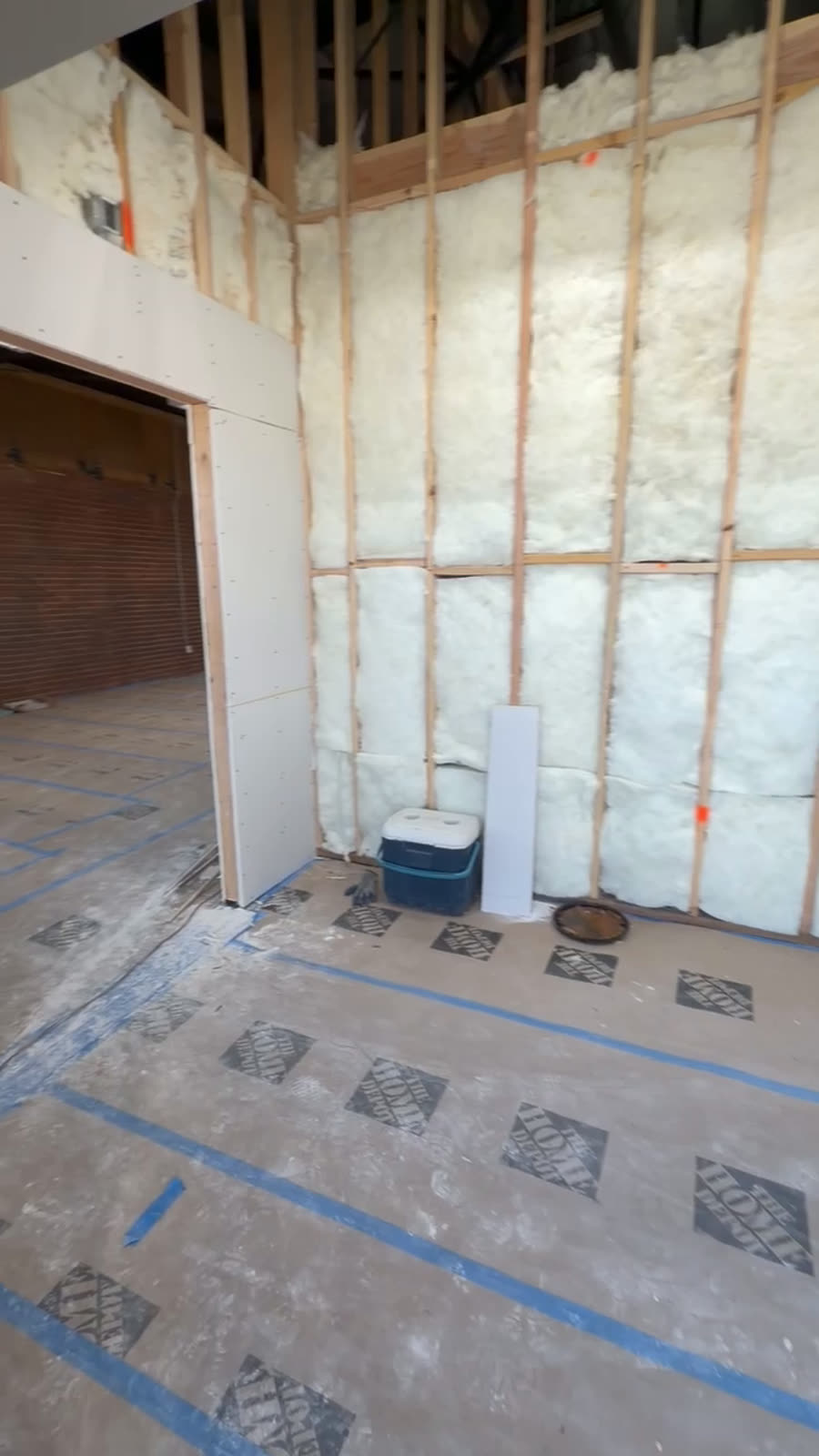 Commercial interior with spray foam insulation applied between the studs and the framing ready for drywall